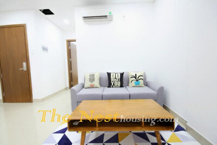 06041233 Young color tone sofa at the entrance of the serviced apartment for rent district 2