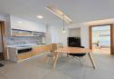 2-Bedroom Apartment – Full Glass Balcony with Scenic View